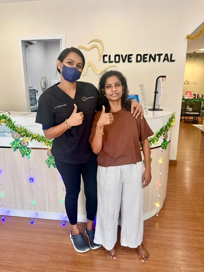 Dr Siva with a patient at Clove Dental
